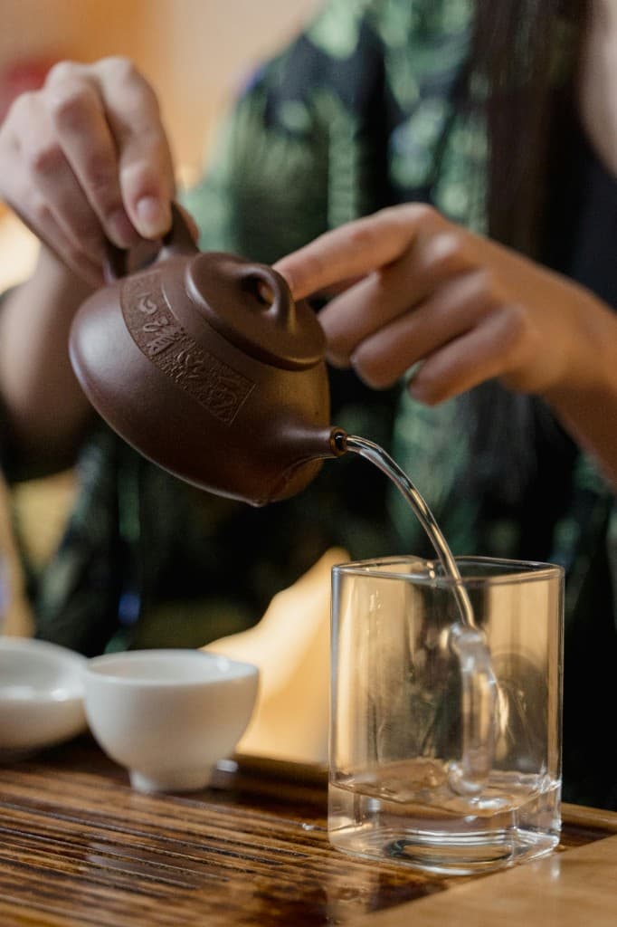Pouring tea in a gong fu style ceremony